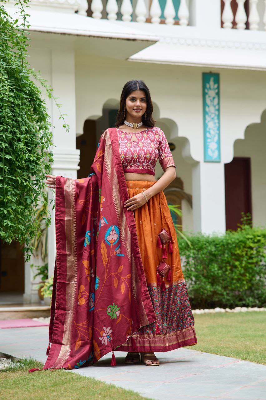 Buy Elegant Orange Dola Silk Meenakari Lehenga Online 